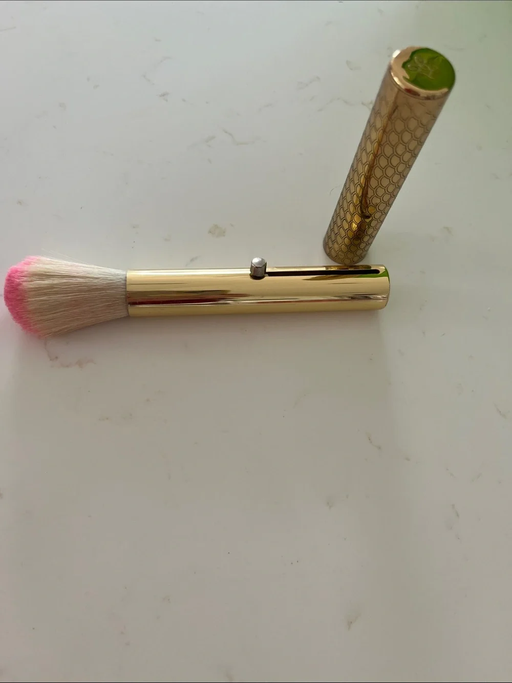 Guerlain Gold retractable brush.